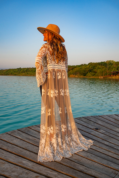 Jill standing by the water